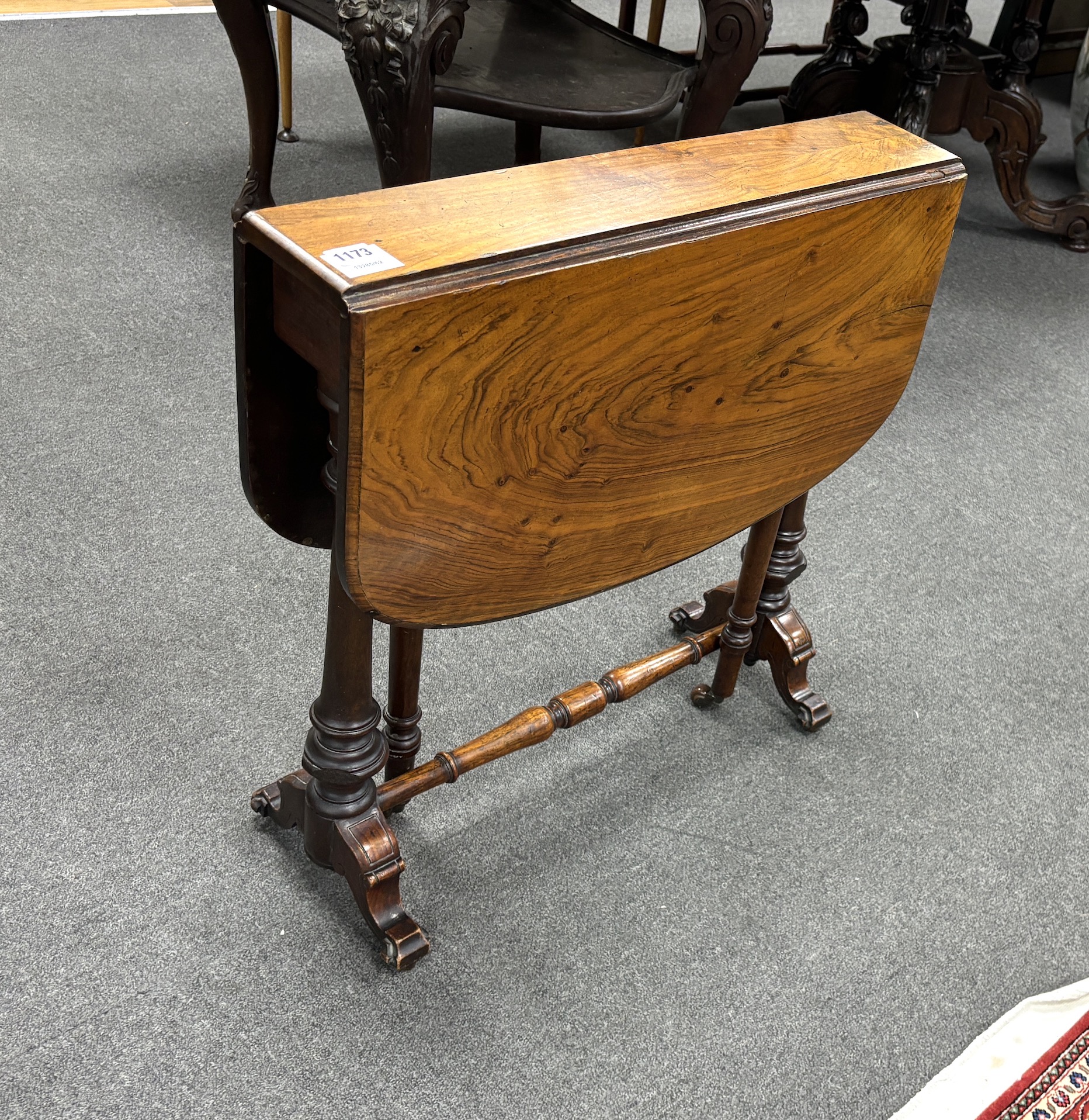 A Victorian walnut Sutherland table, width 63cm, height 63cm